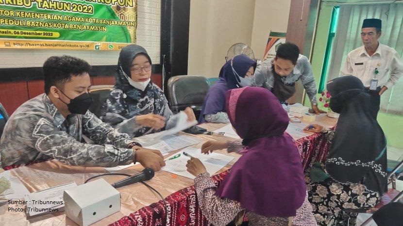 Baznas Banjarmasin Gelar Pembagian Bantuan Uang Tunai Kepada Warga Tak Mampu